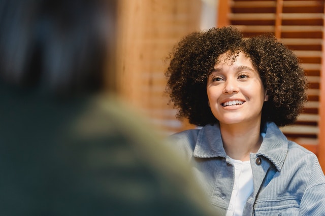 young adult talking to therapist about medication treatment bipolar disorder