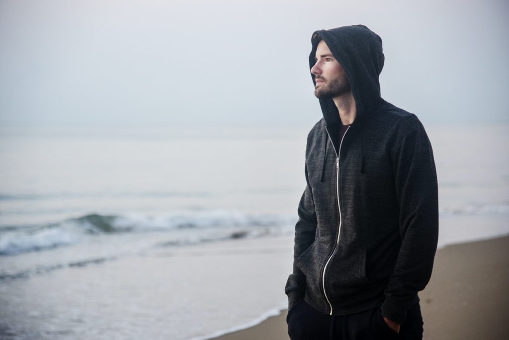Man looking at the ocean