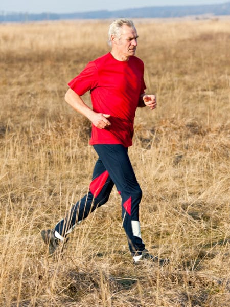 Adult man who has recovered from an acquired brain injury is doing a running exercise.