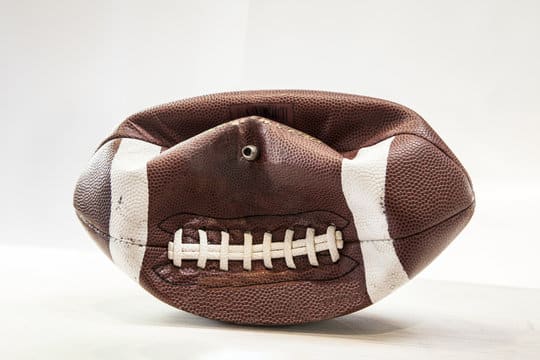deflated football showcasing a lack of enjoyment in daily fun activities
