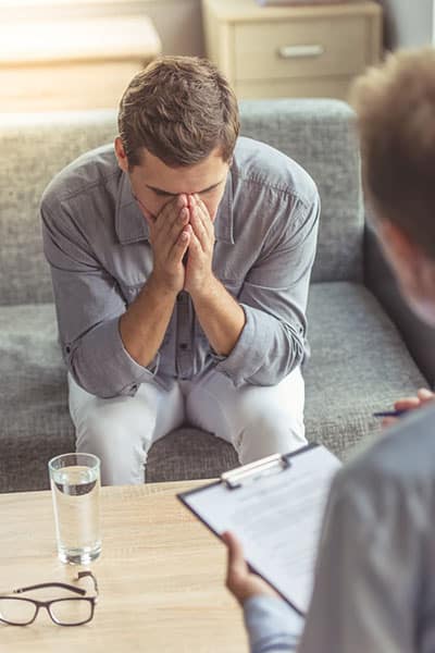 Adult man undergoing schizoaffective disorder therapy. Adult man undergoing schizoaffective disorder therapy.