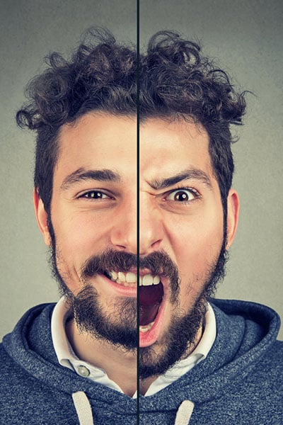 Young man suffering from bipolar disorder.