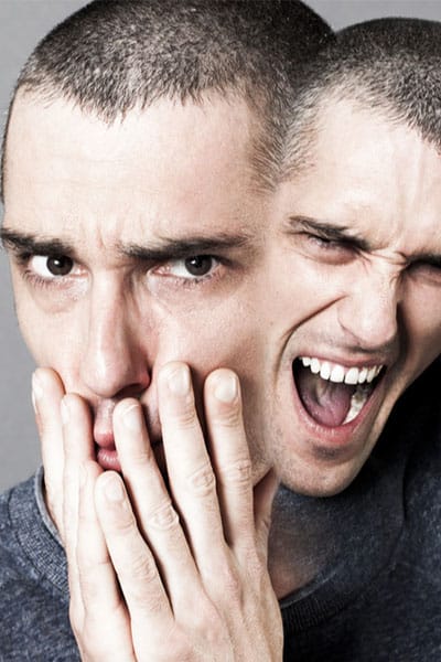 Young adult male suffering from bipolar disorder. Young adult male suffering from bipolar disorder.