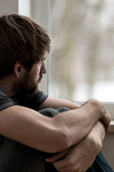 Adult man showing manic symptom in bipolar disorder.